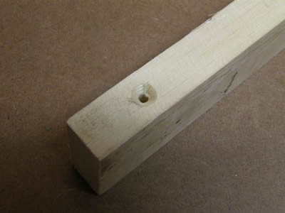 1 x 2 wood with hole.